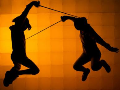 image of two people fencing